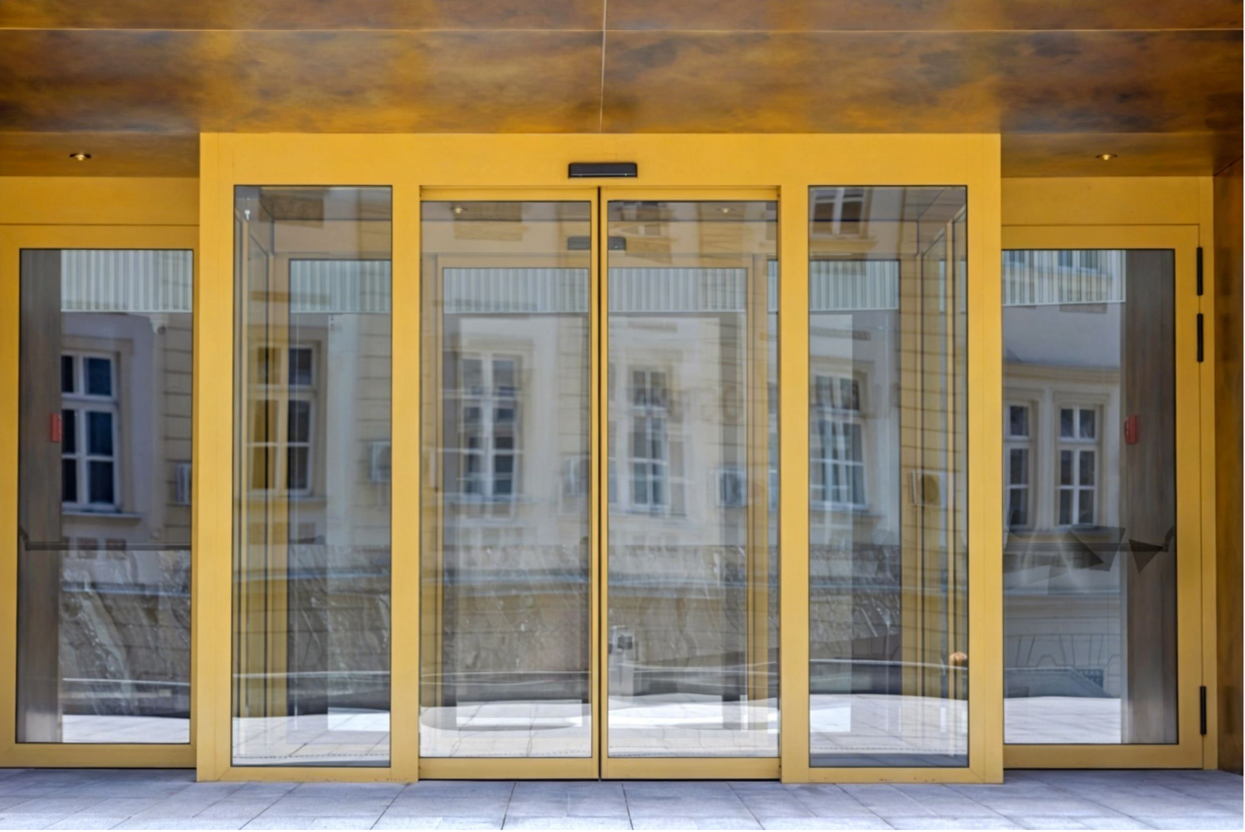 How Do Induction Glass Sliding Doors Enhance Your Brand’s Luxury?