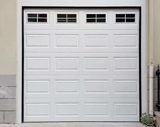 Insulated steel sectional garage doors